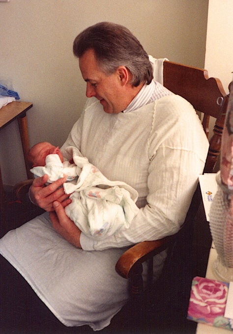 Ron LaCanne holds his first grandchild, Stevie, on January 21, 1992.