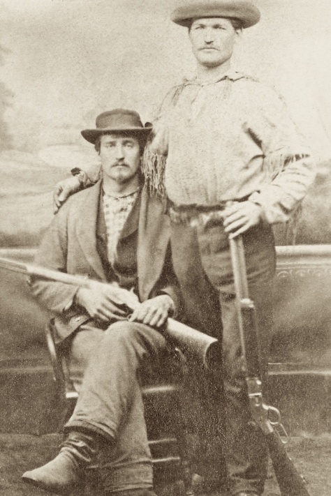 William Gaulke (standing) with his arm around William F. Cody, who later went on to fame as "Buffalo Bill."