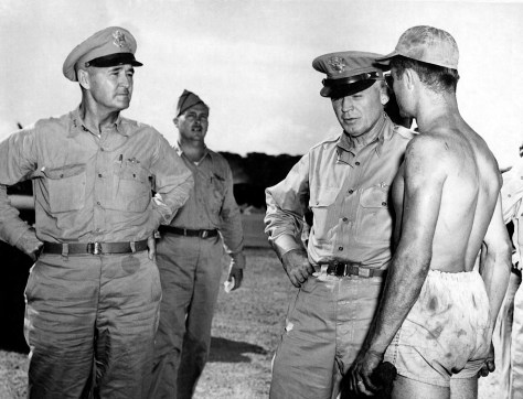 Lt. Gen. Barney M. Giles (left) sent a letter to Edward Mulqueen thanking him for donating a knife to the war effort. Here, he and Gen. Henry H. "Hap" Arnold speak with S/Sgt. Leo Fliess of Sturtevant, Wis., on Guam in 1945. (Army Air Force Photo)