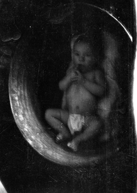 A strange place for a nap, circa 1933.