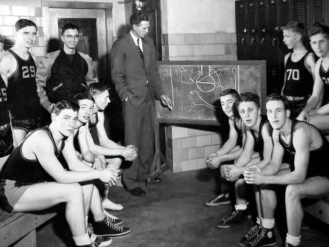 The 1948-49 Mauston junior varsity team, coached by Bob Erickson. Dave Hanneman is first on the bench at left.