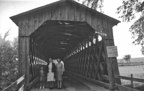 Nina (Treutel) Wilson (center) with daughter Laurni Lee (left) and an unidentified woman stand inside the covered bridge north of Cedarburg, Wis., on June 30, 1941.